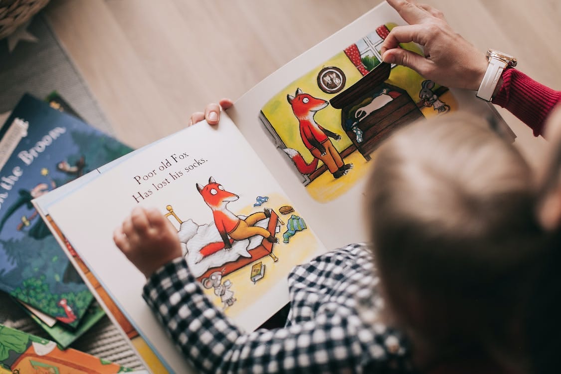 Free Person Reading A Book Stock Photo