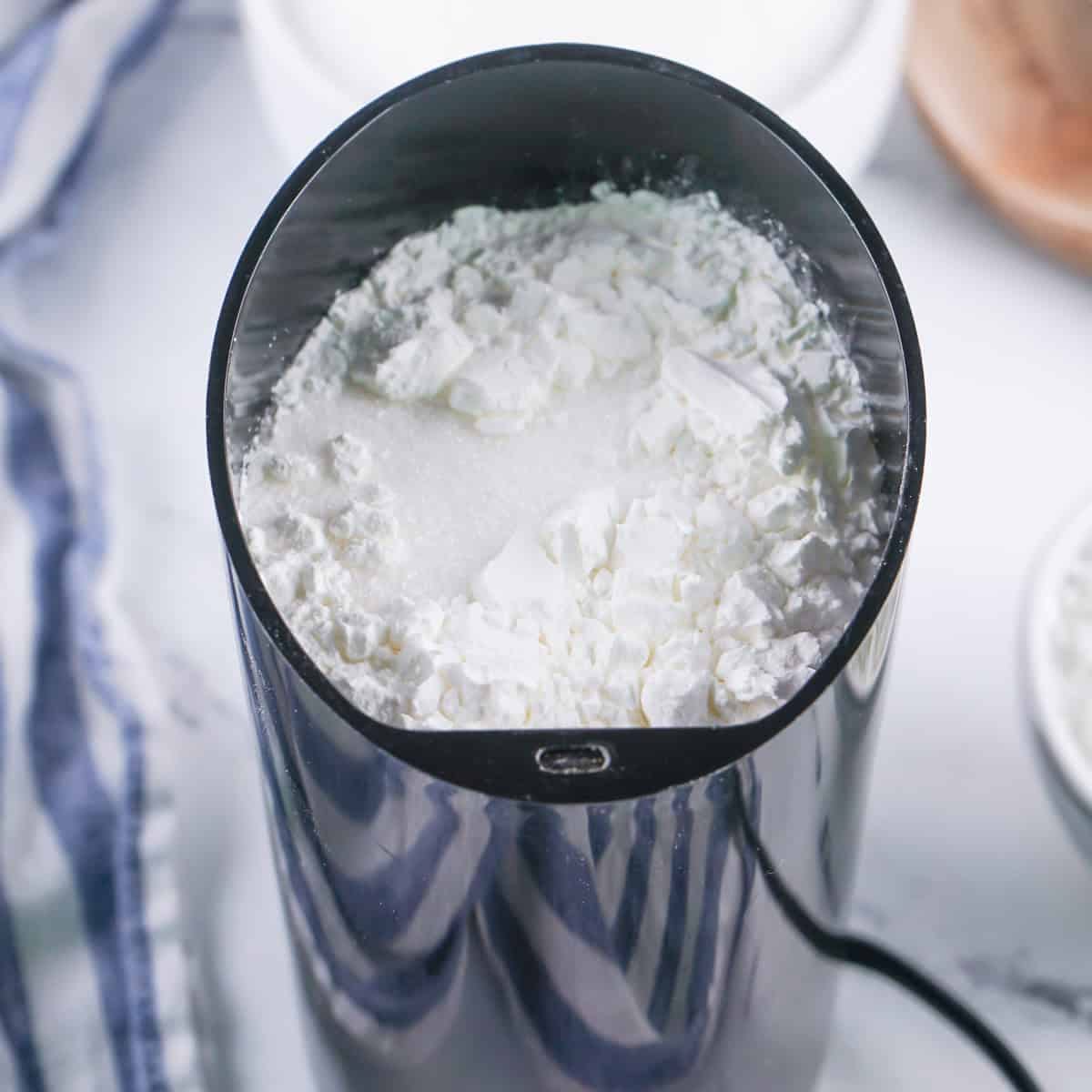 Powdered sugar in spice grinder.