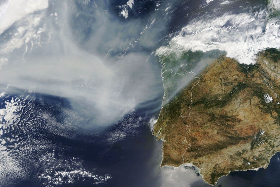 A satellite image shows smoke from Canadian wildfires reaching Western Europe.