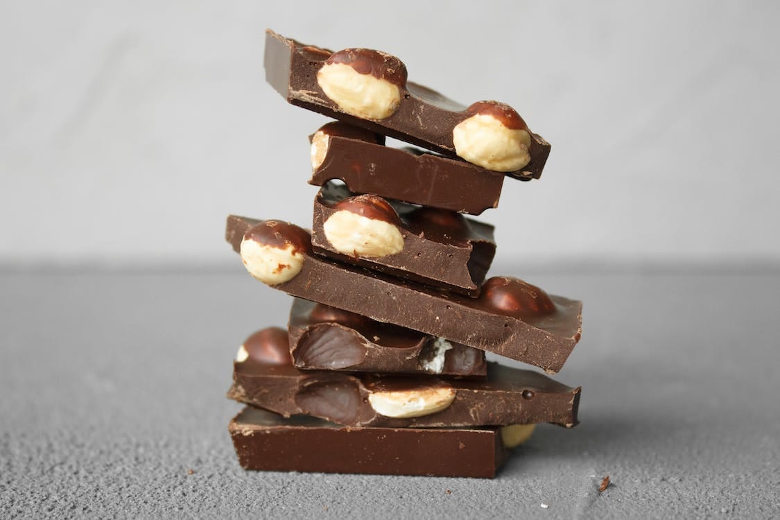 Free Close-Up of Milk Chocolate Bars with Nuts Stock Photo