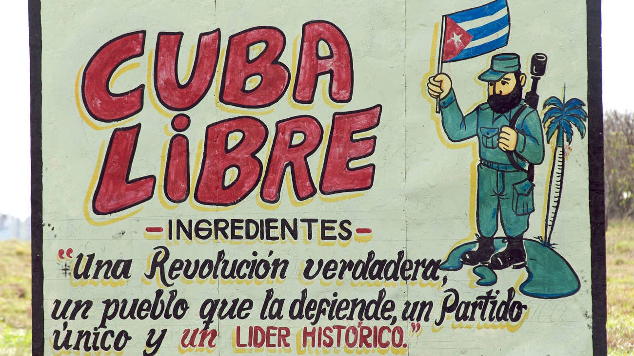 A propaganda poster for the Cuban revolution showcasing former leader and President Fidel Castro