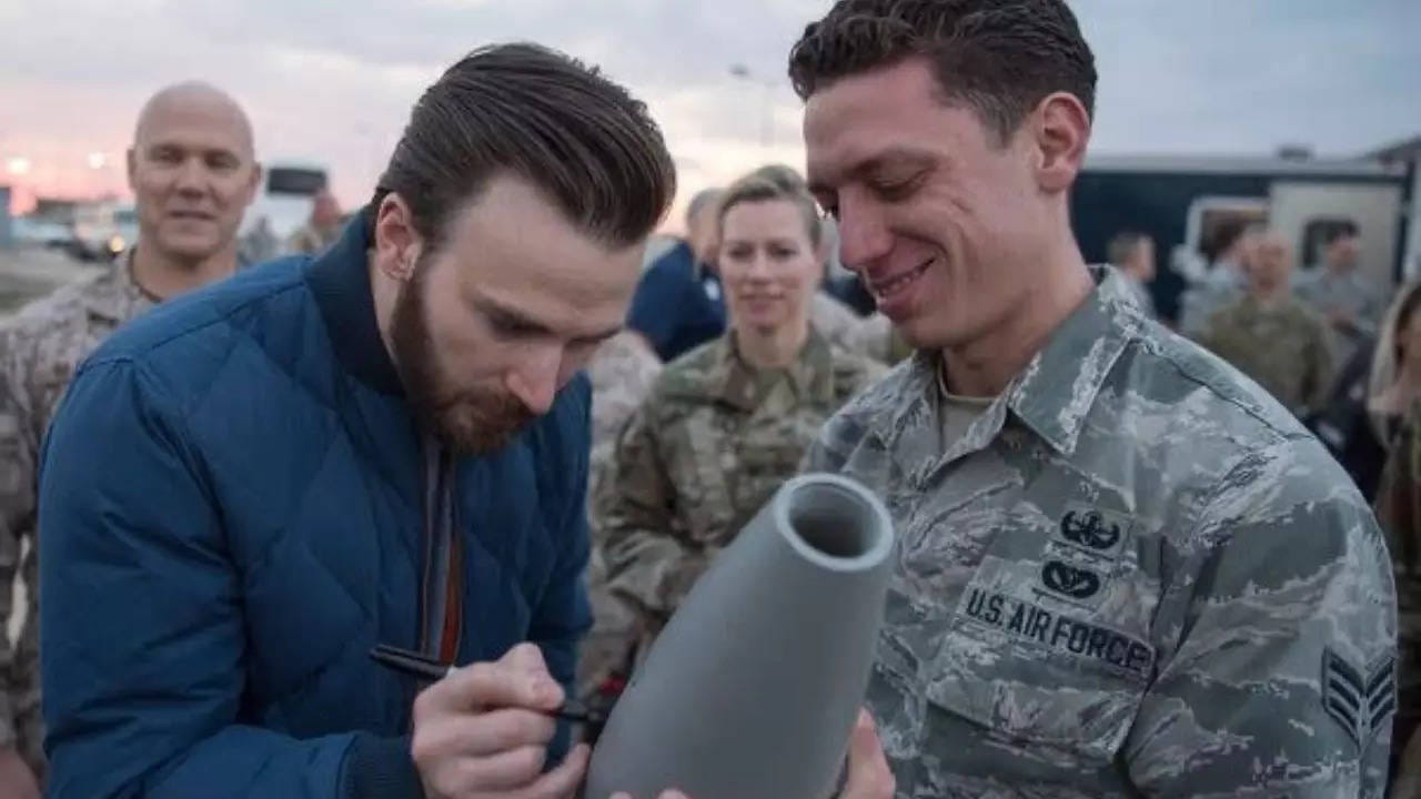 Chris Evans alerts fans about "misinformation" surrounding photo of him  signing a missile | English Movie News - Times of India