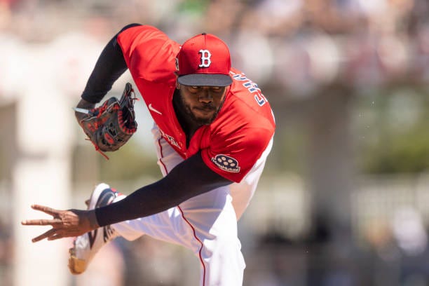 Aroldis Chapman of the Boston Red Sox pitches during the fourth inning of a Grapefruit League game against the Minnesota Twins at JetBlue Park at...