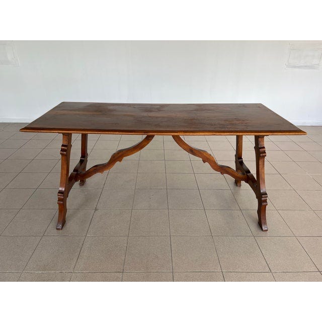 Dimensions: H 31.7" / W 66.4" / D 27.8" Beautiful Italian Tuscan Dining Or Refectory Table made of walnut. The trestle...