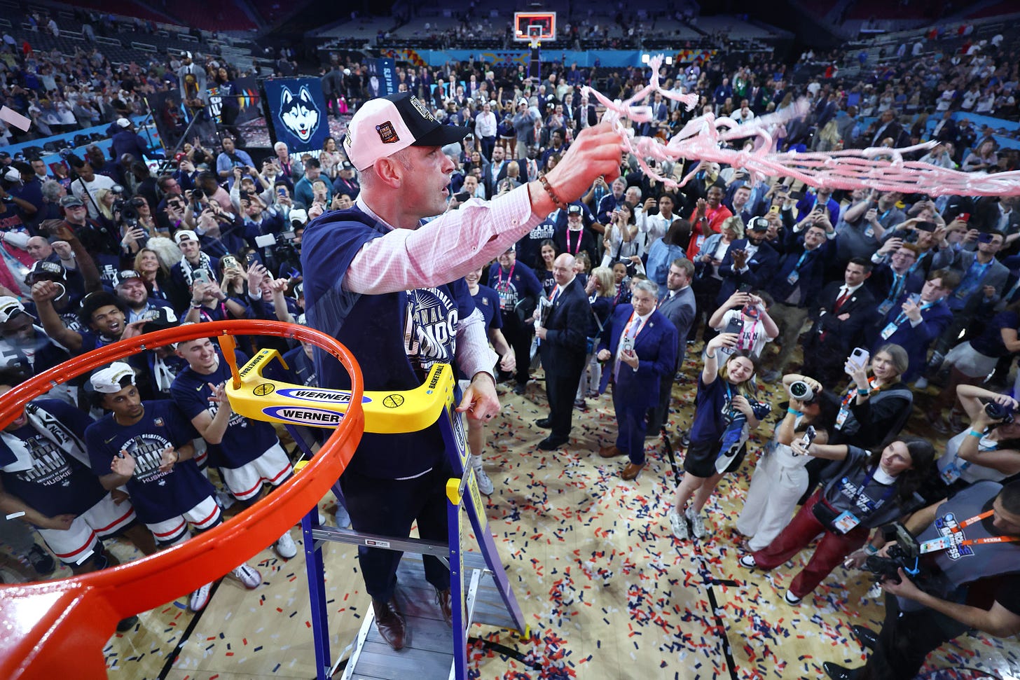 head coach Dan Hurley of the Connecticut Huskies celebrates after defeating the Purdue Boilermakers in the NCAA Men's Basketball Tournament National Championship game at State Farm Stadium on April 08, 2024 in Glendale, Arizona. 