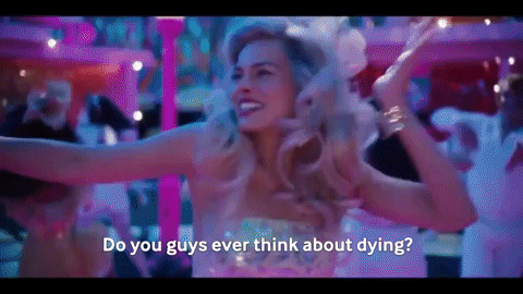 A gif from the Barbie movie where Barbie is dancing on the dance floor at a party and says, "Do you guys ever think about dying?"