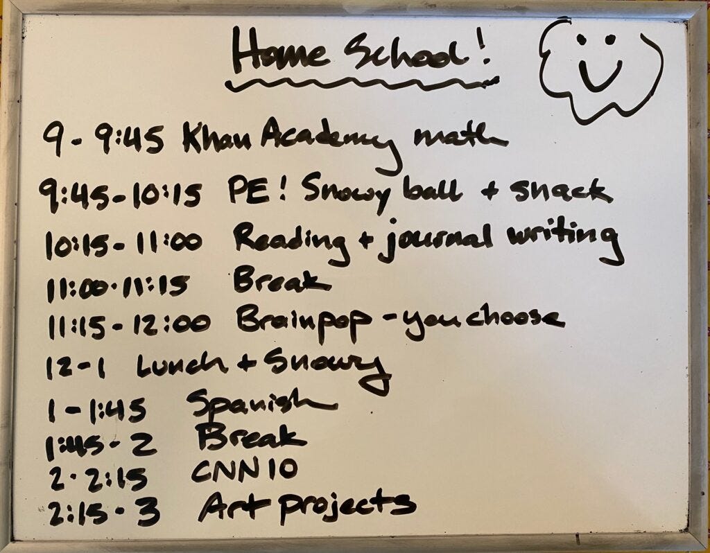 White board with home school schedule