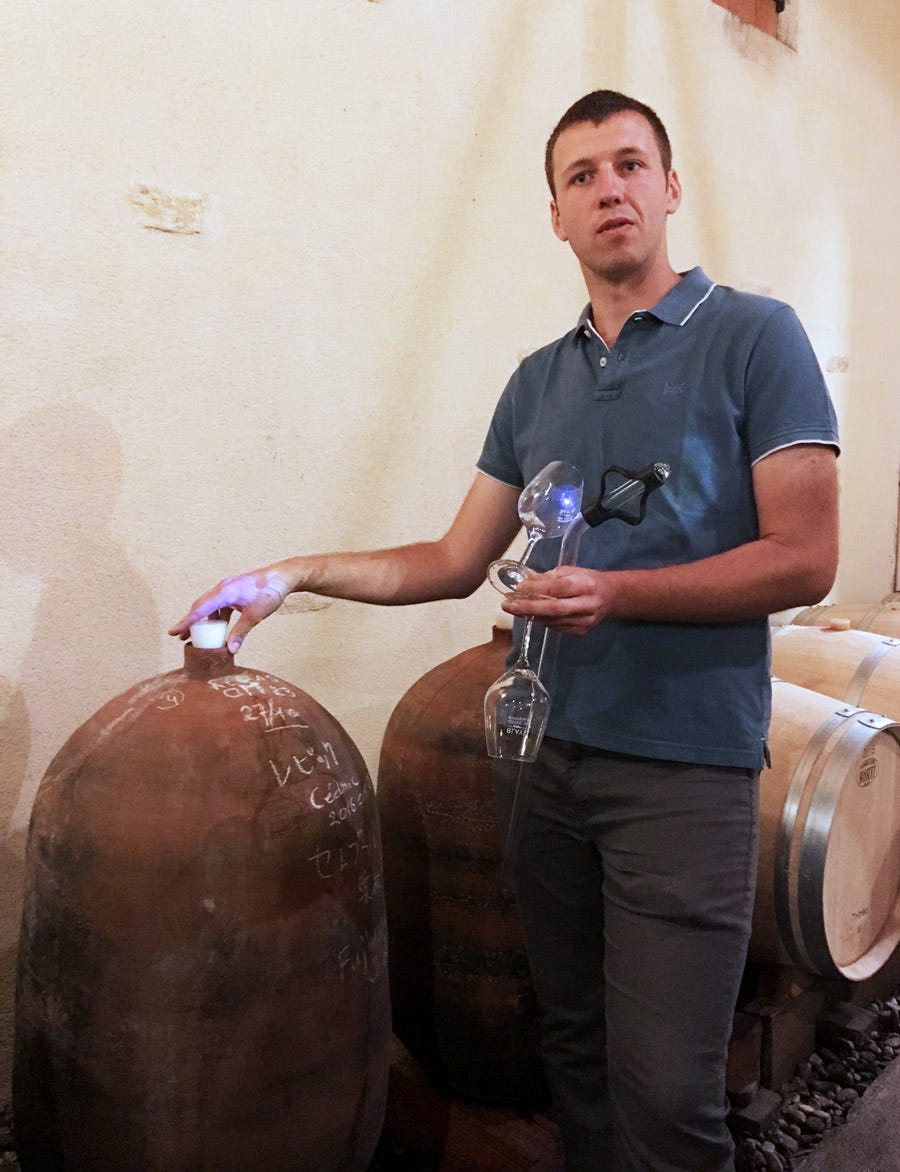 Guillaume Martin with amphorae in the cellar at Ch. Roland la Garde