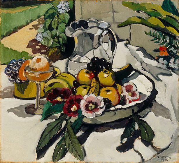 A still life of fruits and flowers in a shallow serving platter, accompanied by a glass serving pitcher and a stemmed wine glass containing a peeled orange. Beyond the table you can make out the edges of a garden, with a bank of green.