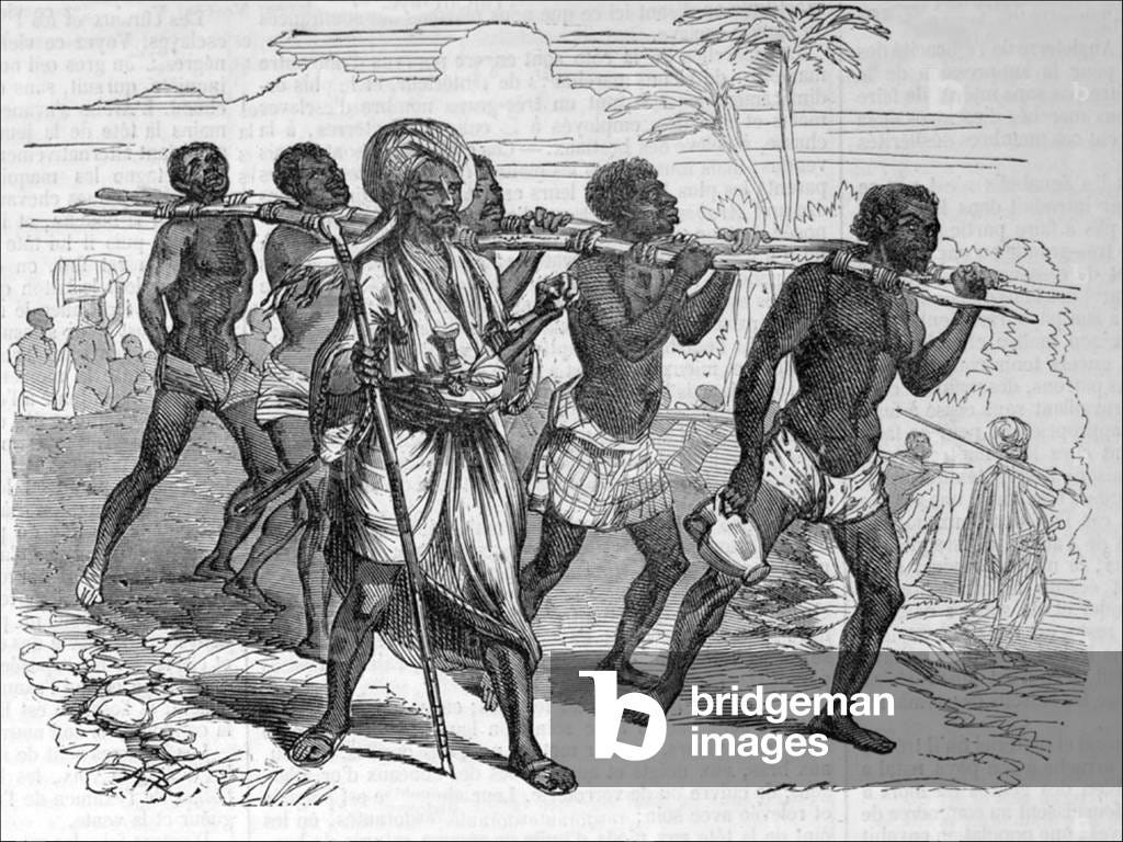 Central Africa: An Arab slaver with a coffle of slaves, 1880s