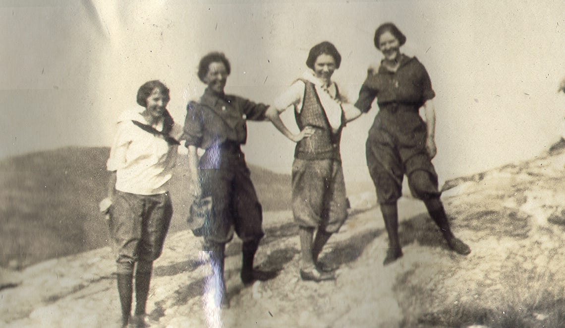 four women on mountain top
