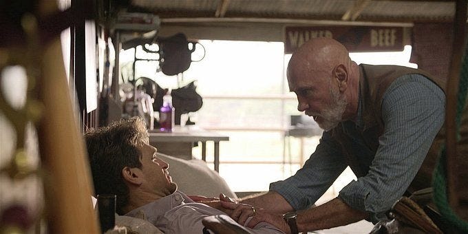 Walker Bonham Mitch Pileggi tends to Liam wounds.