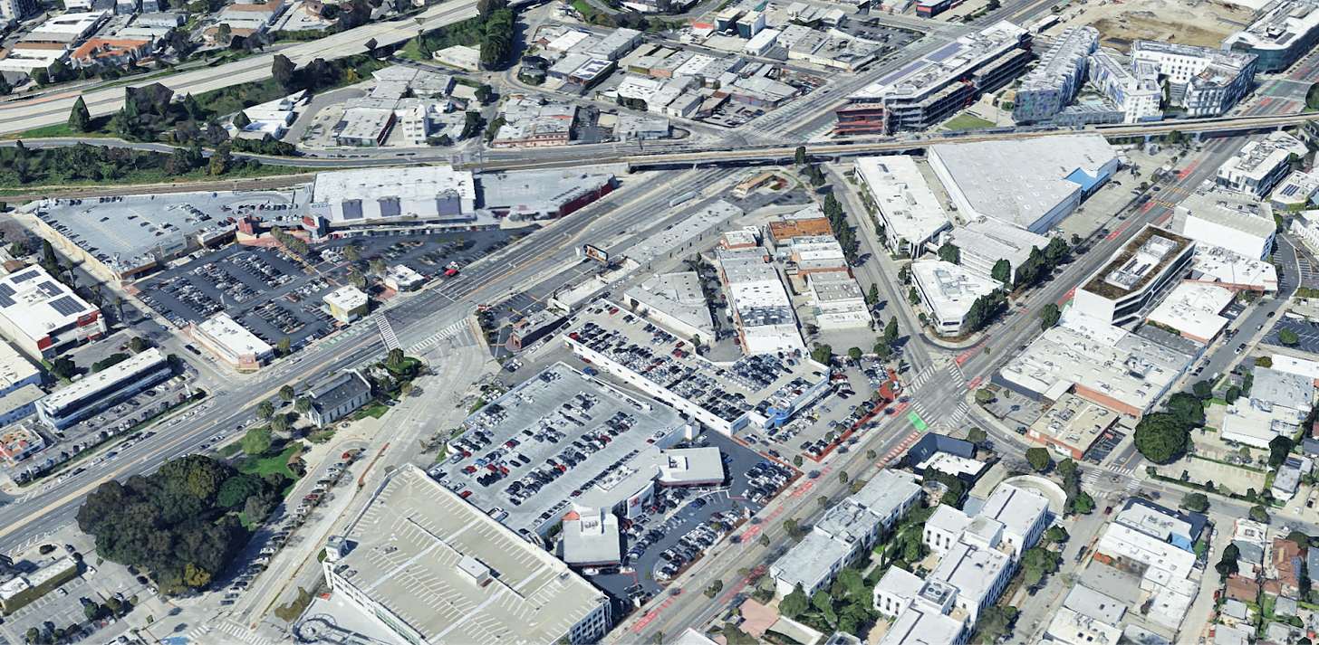 A section of Culver City, where there are car dealerships and a strip mall right next to the Expo Line station. 