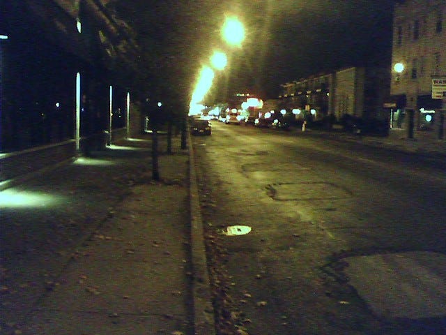 Dark empty city street