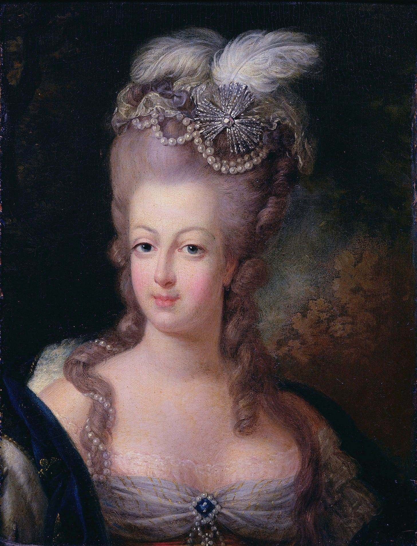 An oil painting of Marie Antoinette, a white woman wearing an ornate headdress.