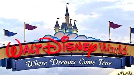 A photo of the arch over the entrance to Disney World, with the slogan, "Where Dreams Come True."