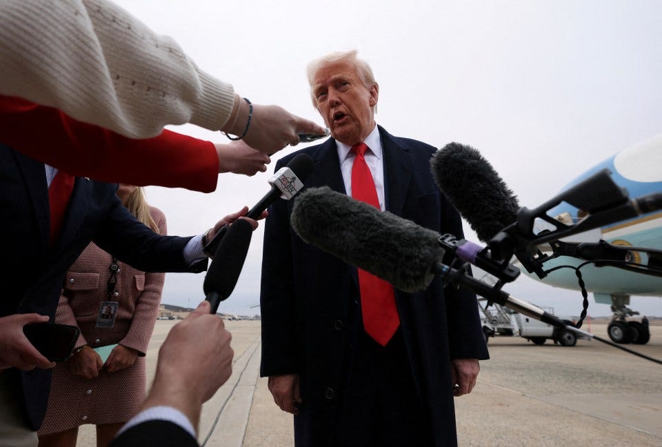Donald Trump speaking to reporters.