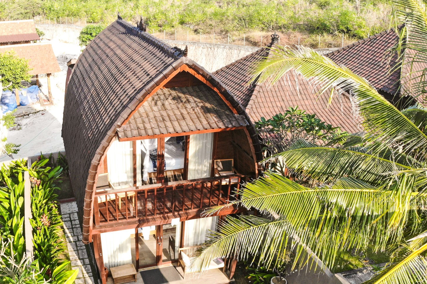 A two-story house in a tropical area