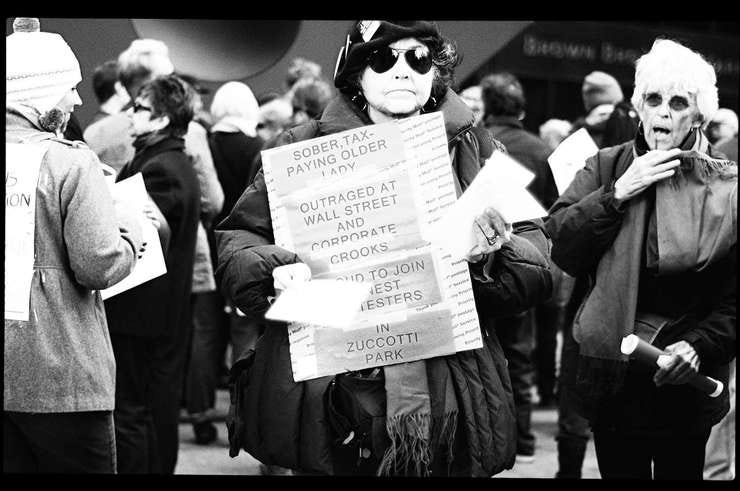 Is this street photography? documentary photography? or maybe both? - Sober, Tax-Paying, Older Lady,Occupy Wall Street, November 2011