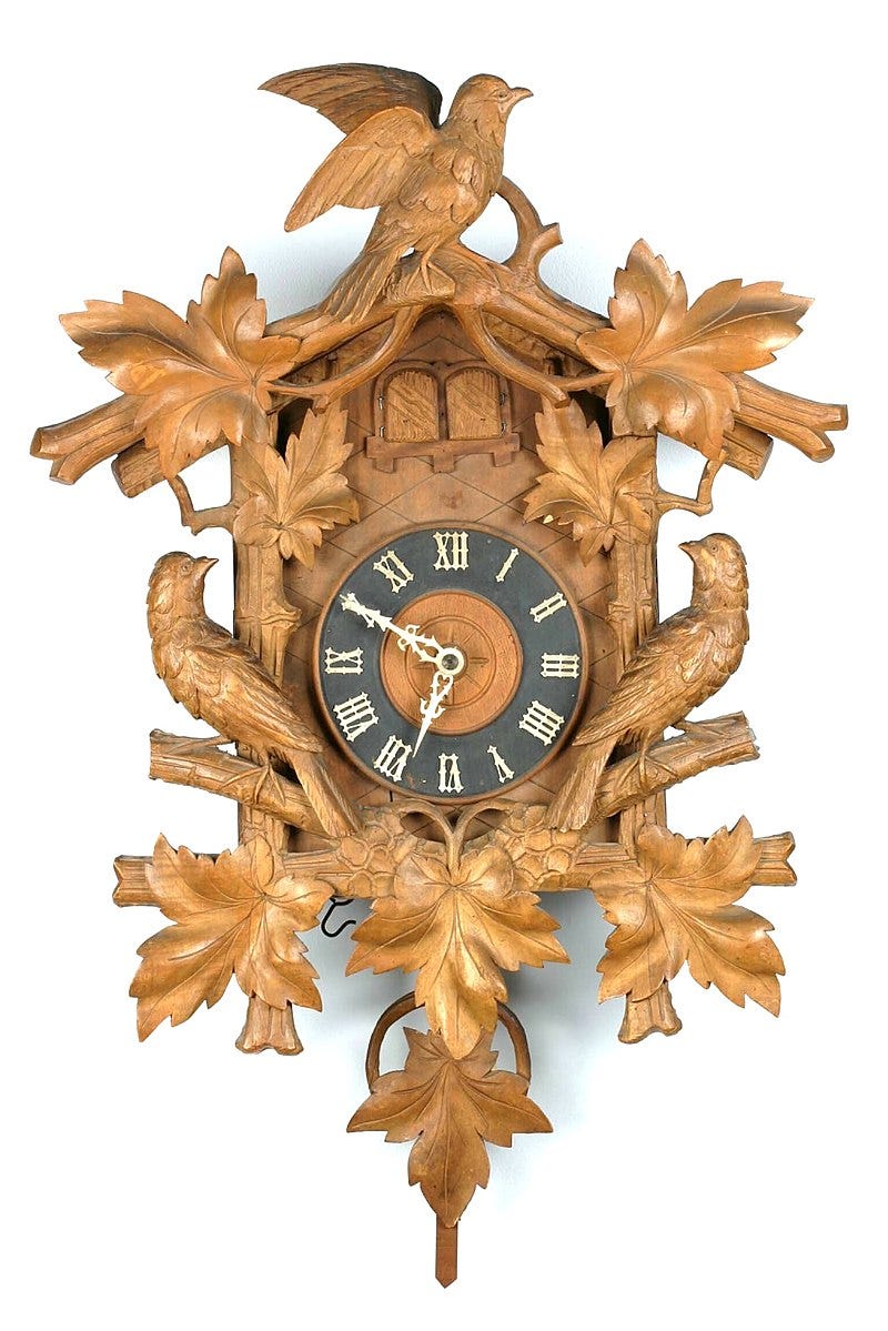 A carved cuckoo and quail clock, ca. 1880 (Deutsches Uhrenmuseum, Inv. 07–2653)