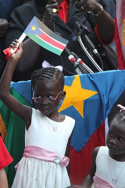 File:A South Sudanese girl at independence festivities (5926735716).jpg