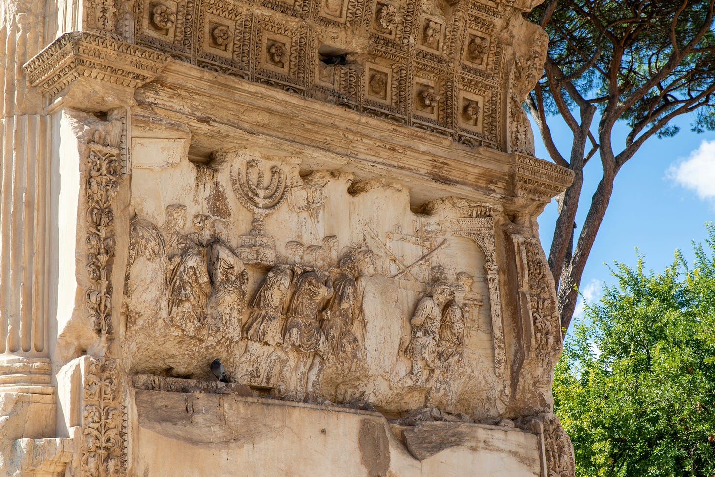 Section of Arch of Titus showing slaves carrying menorah from the Temple in Jerusalem Section of Arch of Titus showing slaves carrying menorah from the Temple in Jerusalem