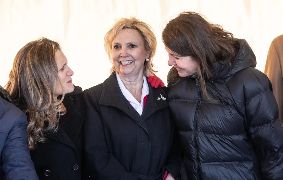 Deputy Prime Minister Chrystia Freeland, left, Fort Saskatchewan Mayor Gale Katchur, centre, and Alberta Premier Danielle Smith chatted in November at Dow Chemical's announcement of plans for the world's first net-zero carbon emissions plastics complex.