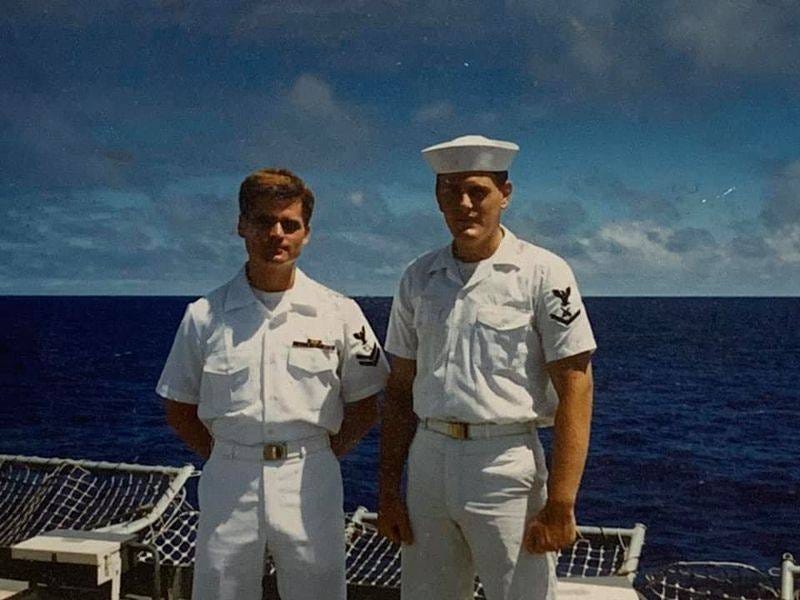 Kevin Day (left) during his time in the Navy.