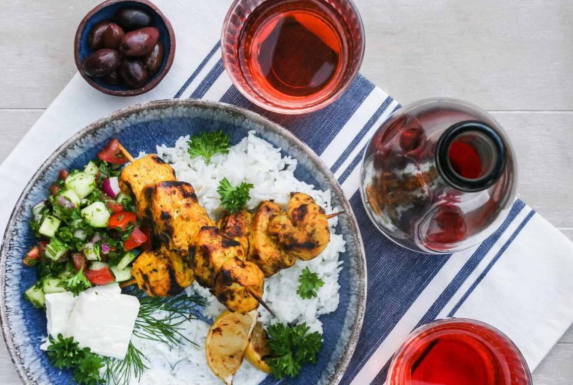 chicken kebabs with salad