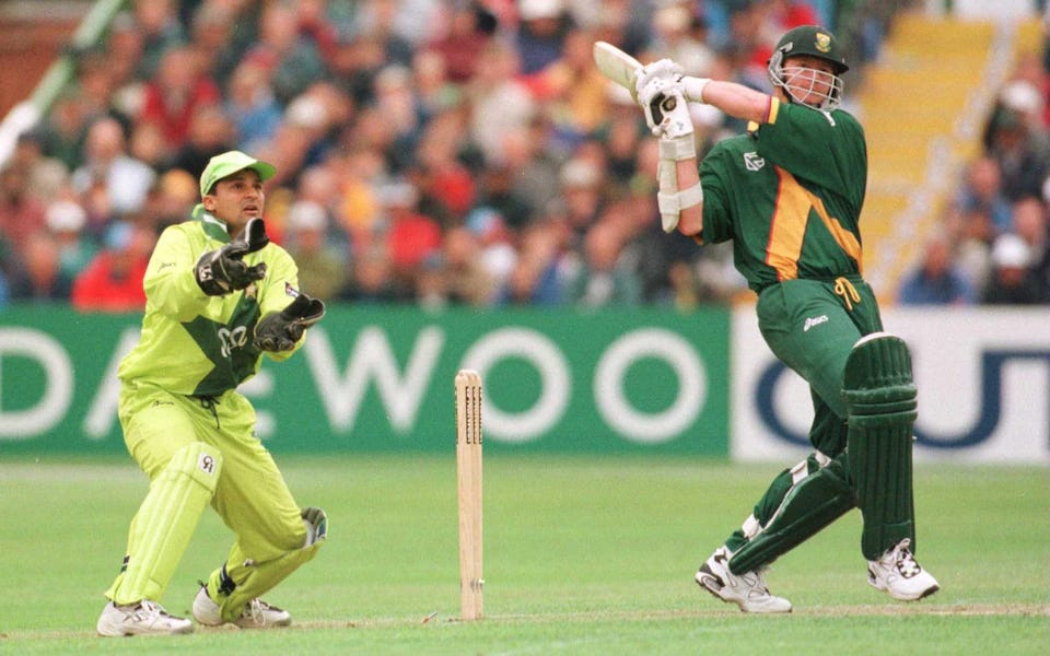 Lance Klusener plays an attacking shot against Pakistan during World Cup ‘99, while Moin Khan watches behind the stumps