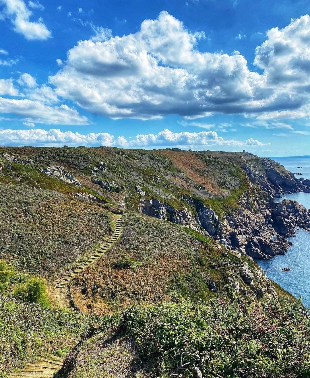 “A rambler’s paradise - Guernsey’s wild and rugged coast boasts over 42 miles of walking trails with the southerly cliff paths covering 28 miles from La Vallette to Pleinmont. South coast cliffs, Guernsey” Caption by Visit Guernsey and Photo by Cheryl Anne 