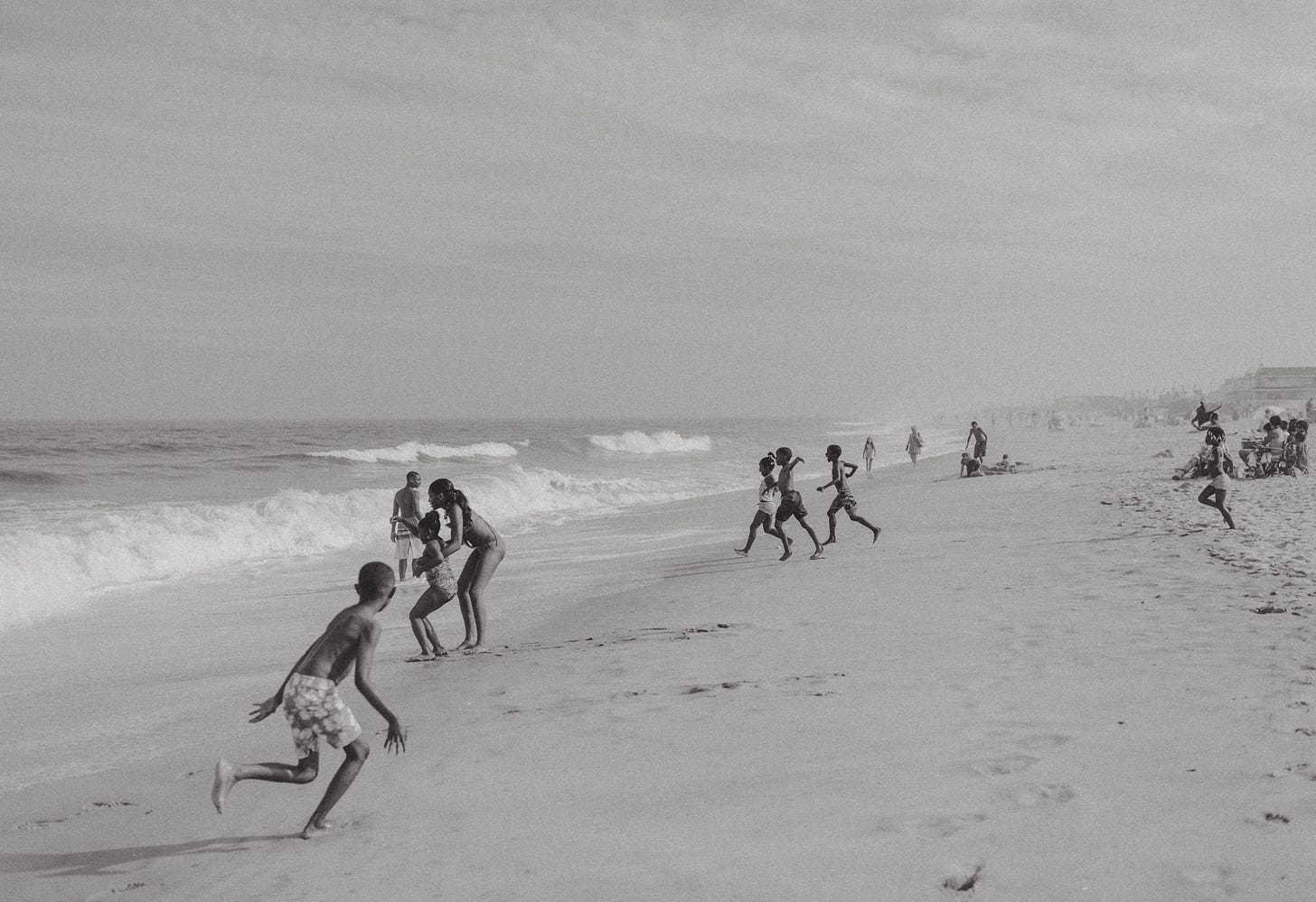 kids running into the ocean in seaside heights kids running into the ocean in seaside heights