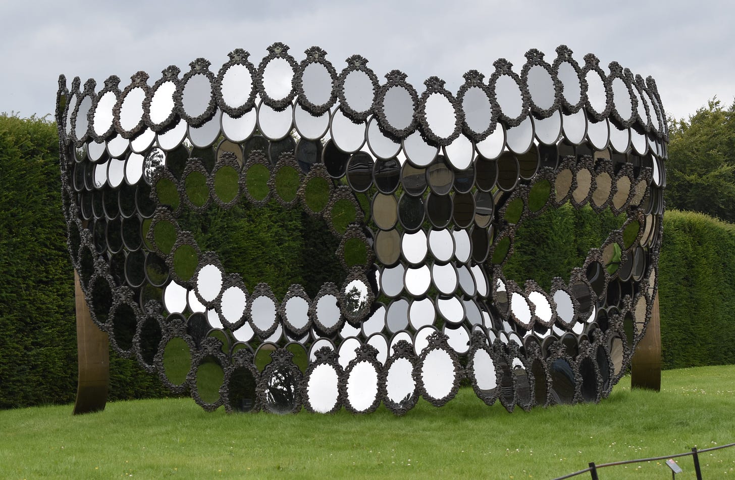 Sculpture of a mask made from mirrors