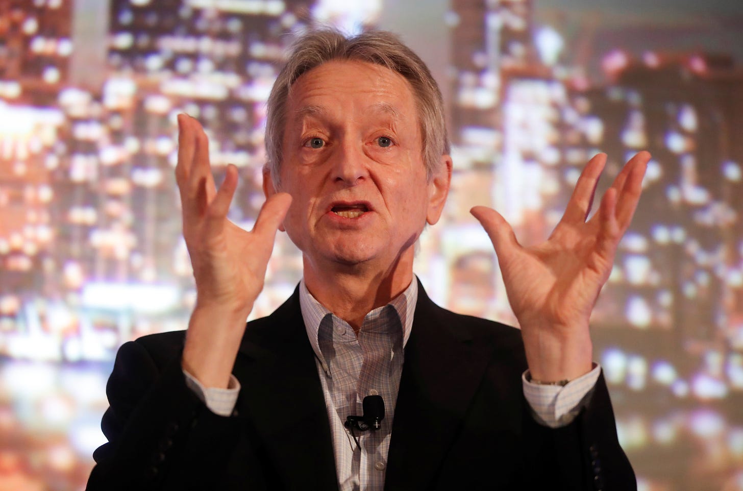 Tech godfather Geoffrey Hinton: AI could rewrite code, escape control