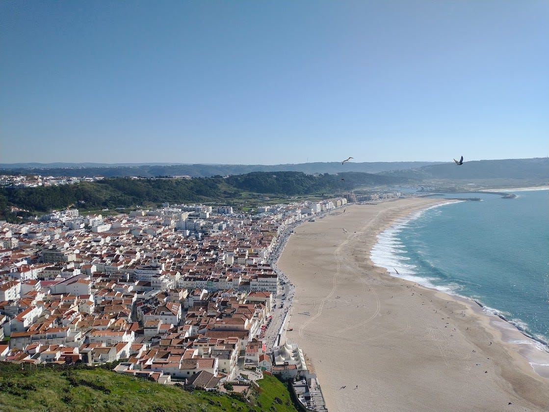 A view of the town and beach of Nazare, Portugal from the cliff to the north.