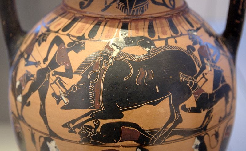 Photograph of a black figure vase showing stylized heroes attacking a massive boar