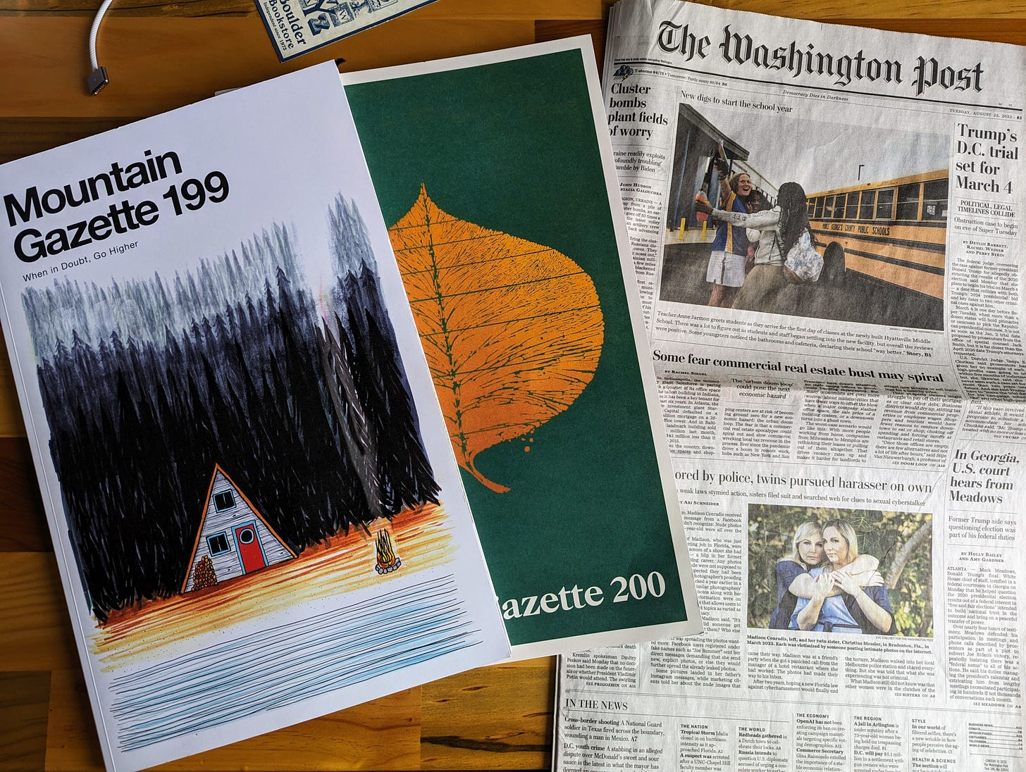 The covers of Mountain Gazette 199 and 200 and an issue of The Washington Post.