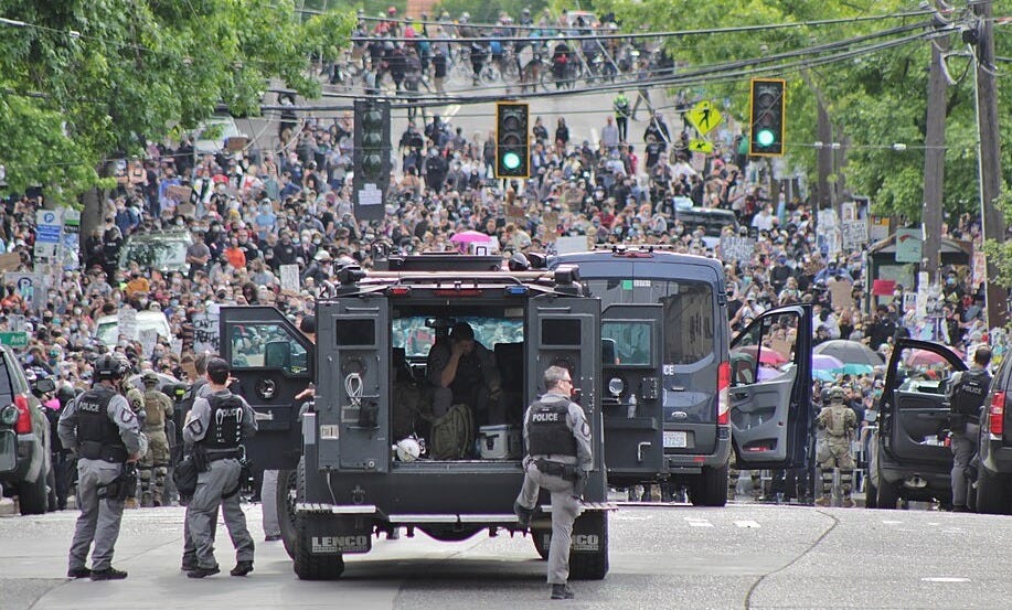 File:George Floyd protests in Seattle - June 3, 2020 - police vehicles on Capitol Hill.jpg