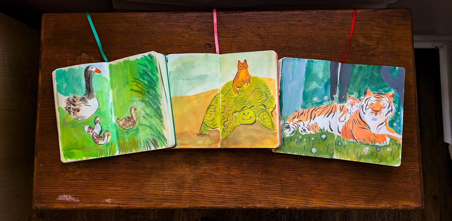 open sketchbooks with painted animals by Beth Spencer