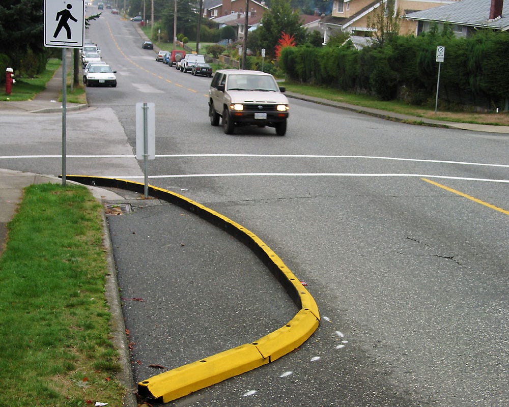 File:Temporary rubber curb extension.jpg - Wikimedia Commons