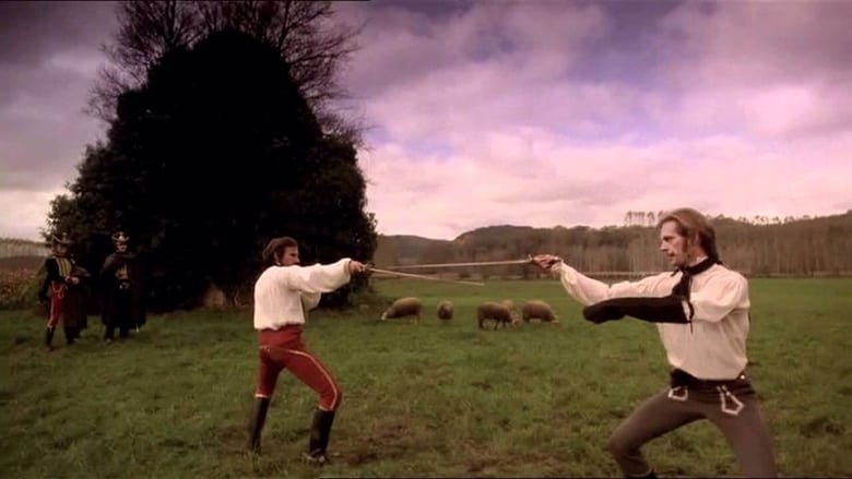 Still from Ridley Scott's 1977 movie The Duellists. Two men, played by Harvey Keitel and Keith Carradine, are holding each other at swordpoint in a field.