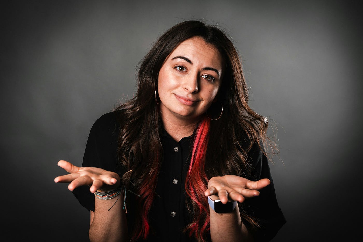 Woman with palms up, confused about needing a niche