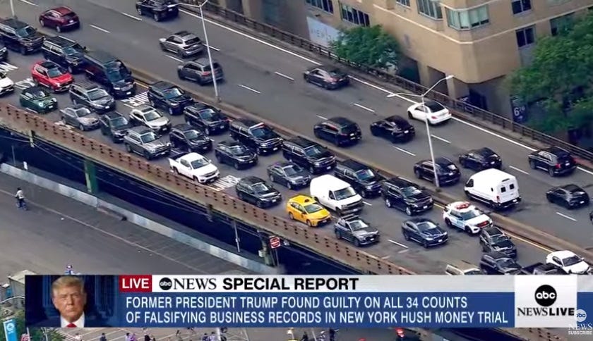 screenshot of ABC News coverage of Trump's motorcade leaving the courthouse, shot from helicopter showing crowded NYC highway.