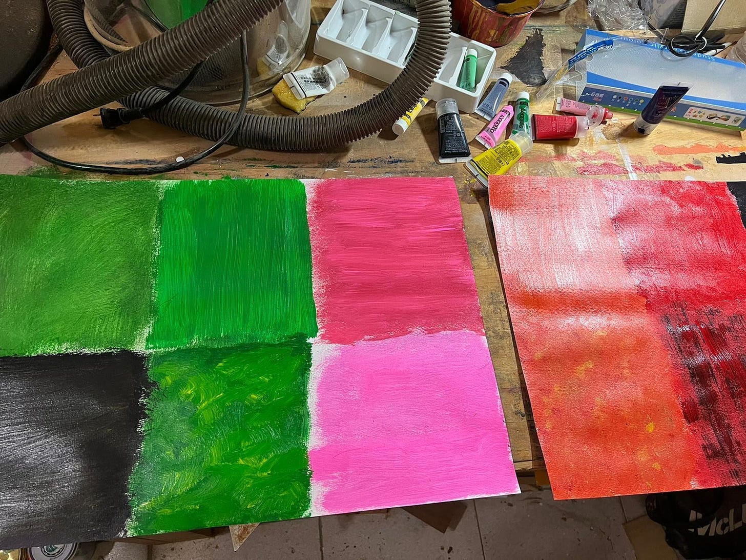 A workshop with more colored painted pallets