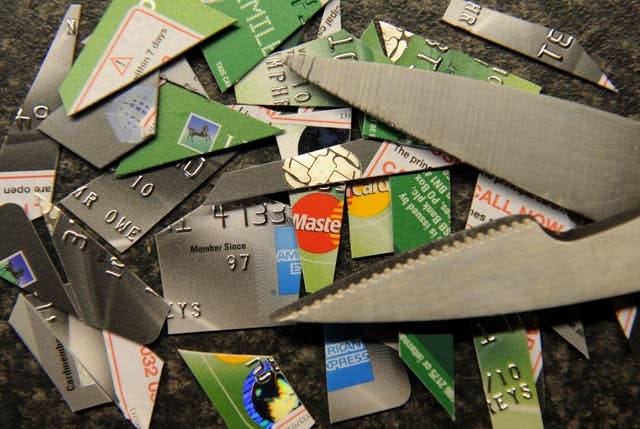 Credit cards being cut up