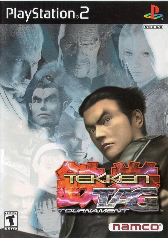 The box art for Tekken Tag Tournament, which includes a deceased character, Kazuma, front-and-center, letting you know this is a spin-off if you have any idea about Tekken. Nine other characters are in a faded-out background, and the game's logo is at the bottom right.
