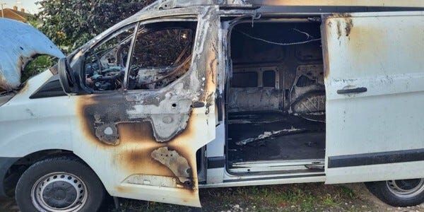 Burnt-out white van