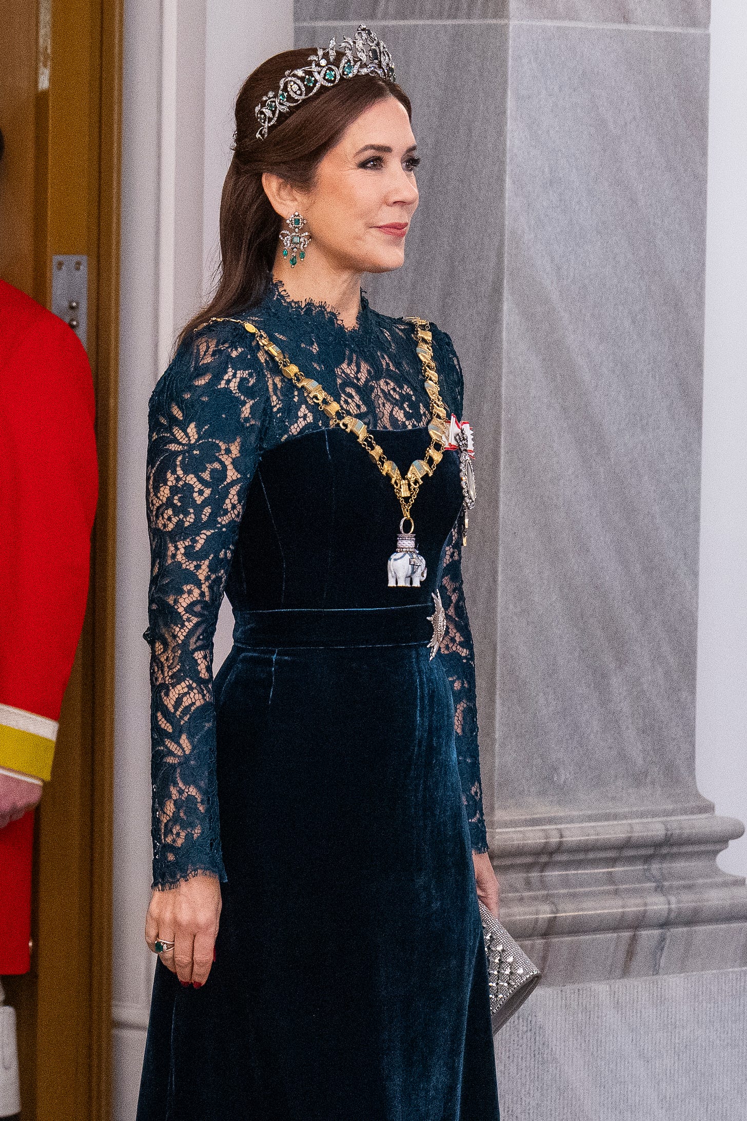 Queen Mary in green lace gown and emerald tiara