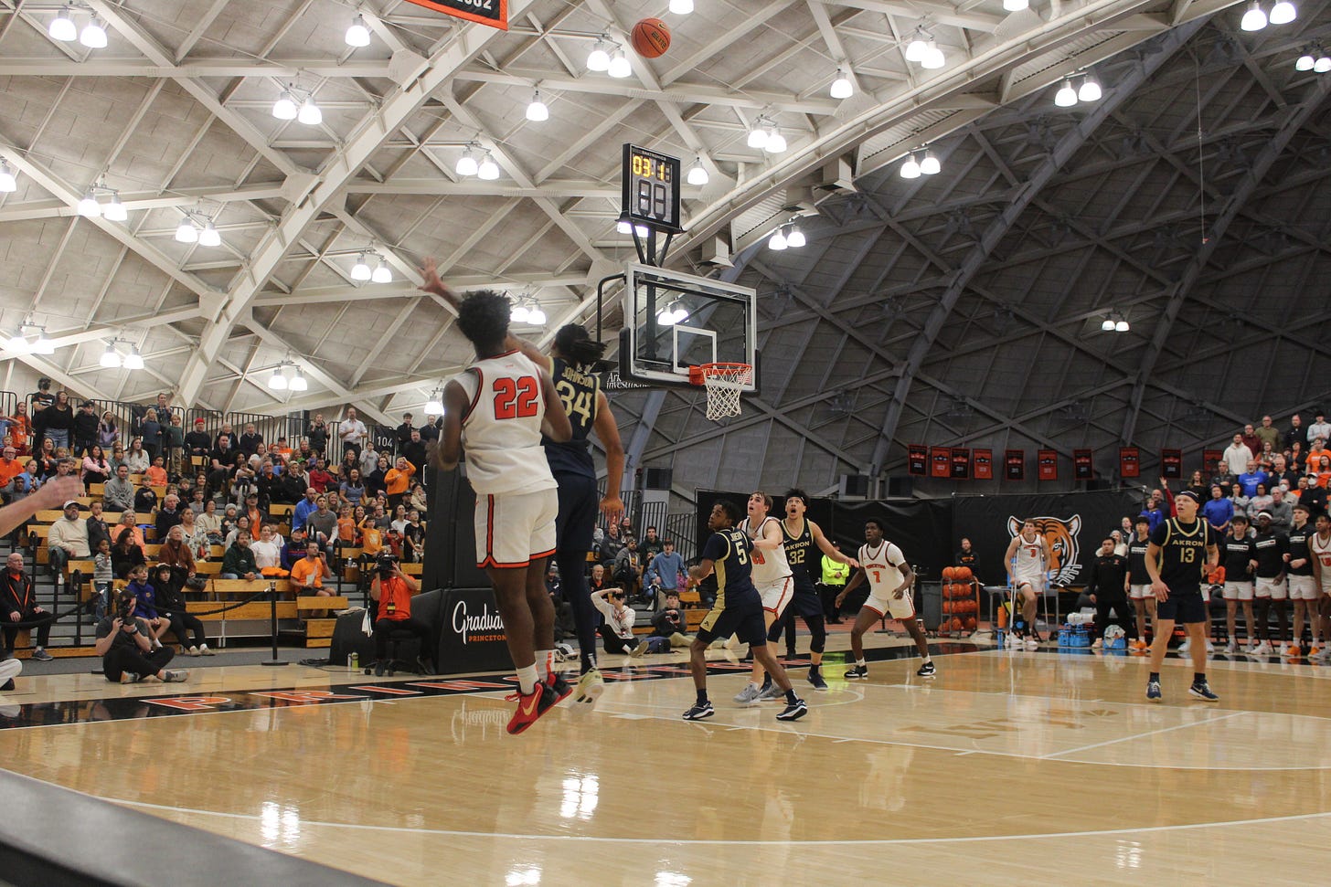 Dalen Davis (22) makes the game-winning shot for Princeton against Akron on Dec. 30, 2024. (Photo by Adam Zielonka) Dalen Davis (22) makes the game-winning shot for Princeton against Akron on Dec. 30, 2024. (Photo by Adam Zielonka)
