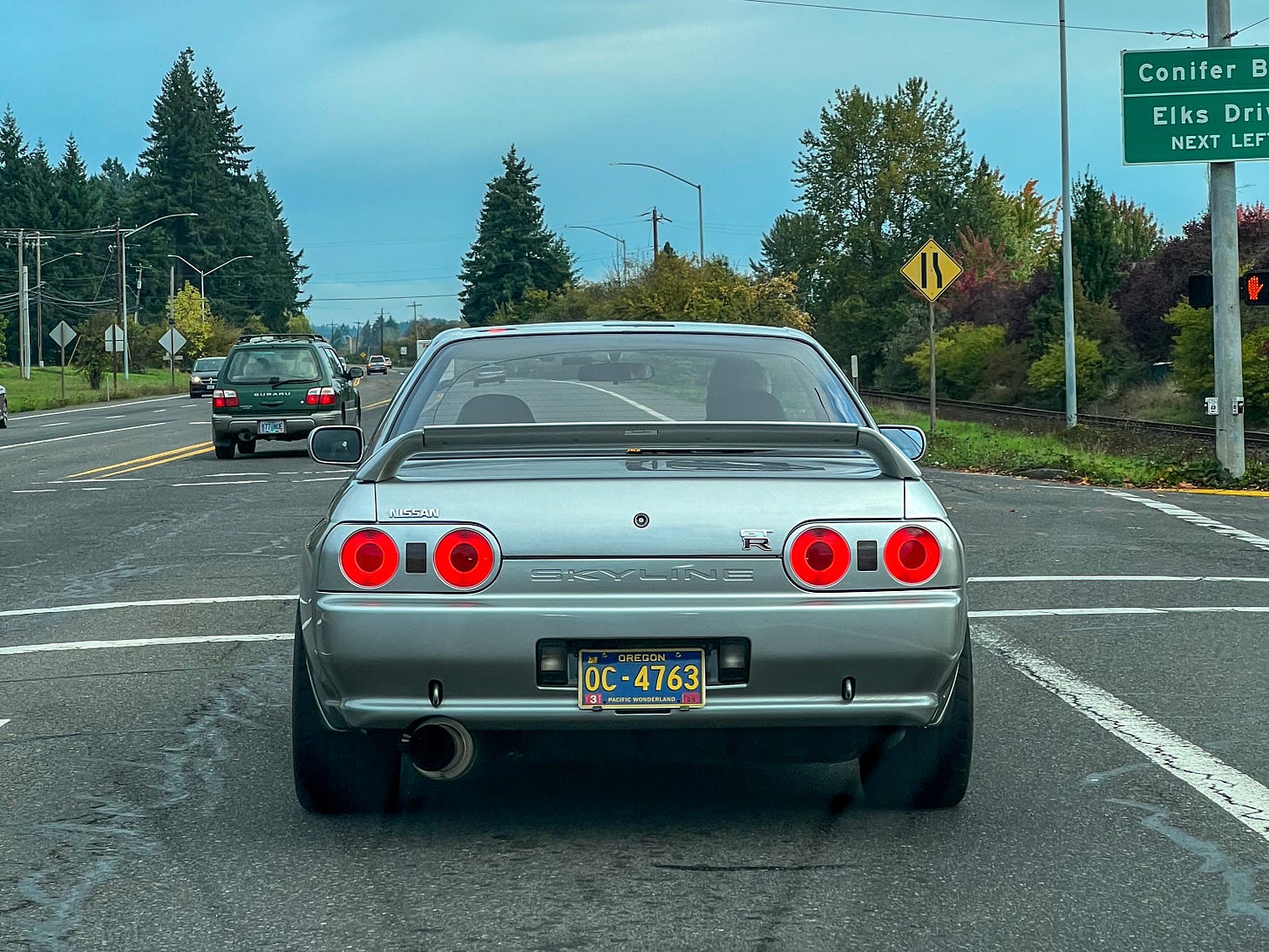 Rear view of a silver Nissan R32 Skyline GT-R once imported by MotoRex and owned by founder Hiro Nanahoshi, now owned in Oregon. Photo by Ryan ZumMallen.